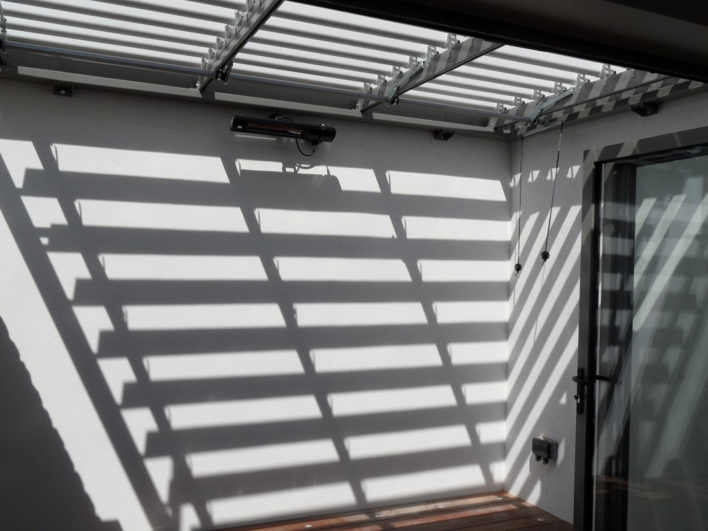 23a Kew, London – Roofing over courtyard to create private all weather outdoor room.